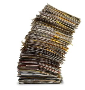 Leaning-stack-of-papers-and-files